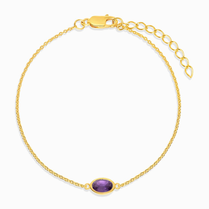 Pulsera de oro con piedra natal de febrero, Amatista. Pulsera de cristal con cristal violeta Amatista.