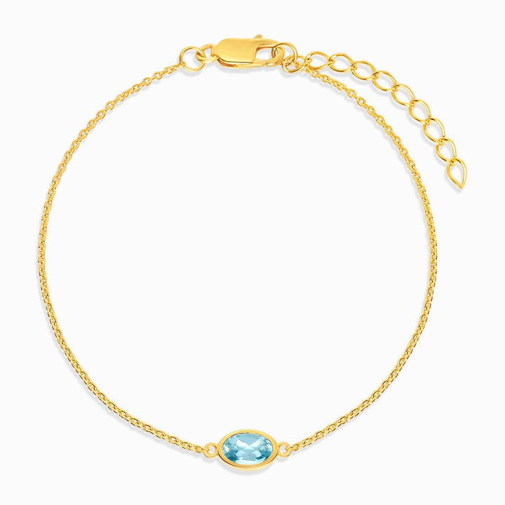 Pulsera con piedra de nacimiento de diciembre en oro con topacio azul. Pulsera de cristal con Topacio azul en oro.