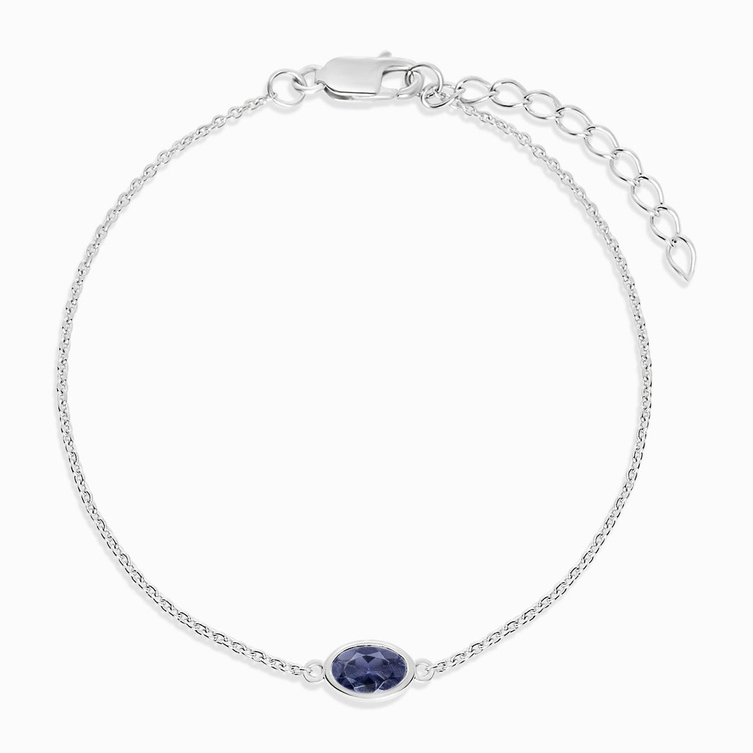 Pulsera de plata con piedra natal de septiembre, Iolita. Pulsera de plata con cristal de Iolita azul y violeta.