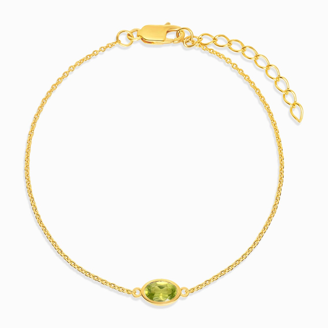 Pulsera con cristal verde Peridoto en oro. Pulsera de piedras preciosas con Peridoto en oro.