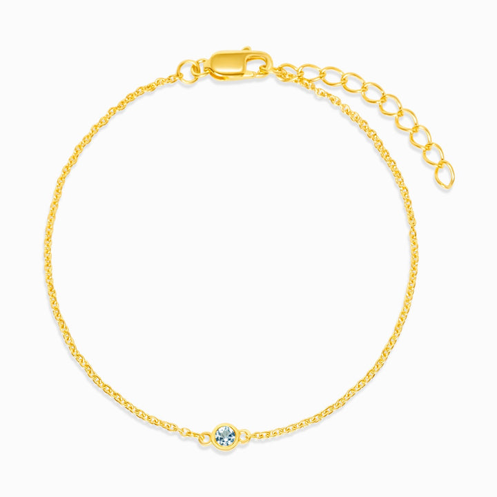 Joya de topacio azul para llevar como pulsera. Pulsera de cristal con Topacio Azul en oro.