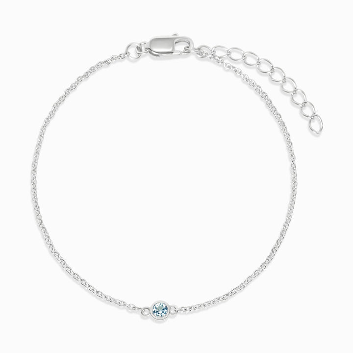 Pulsera con topacio de piedra azul en plata. Joyas con cristal Topacio que simboliza la comunicación.