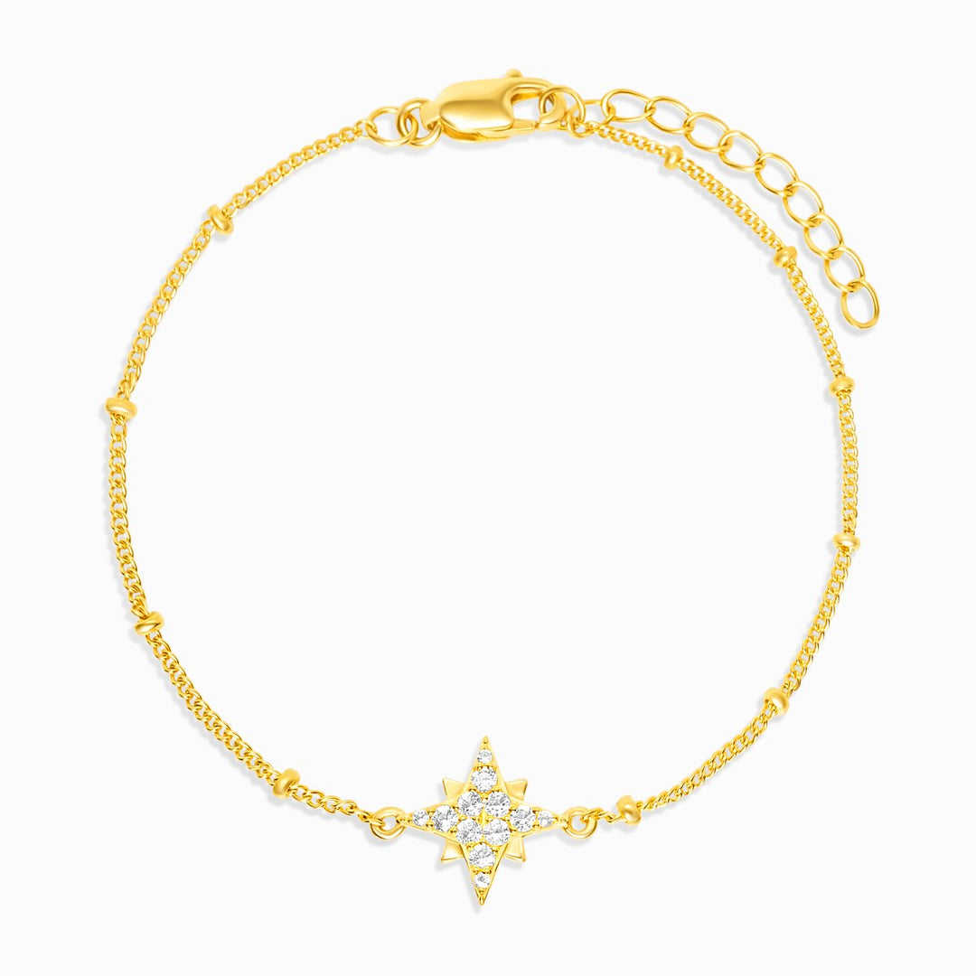 Pulsera de oro con estrella de cristales. Preciosa pulsera Estrella en oro y con piedras de Topacio Blanco.