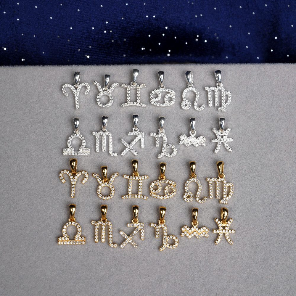 Charms de cristal con signos del zodíaco. Joyas de topacio blanco con signos del zodiaco en plata y oro.