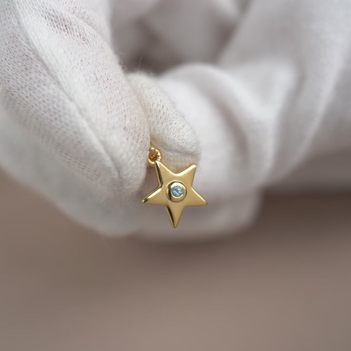 Colgante Estrella Topacio azul Oro